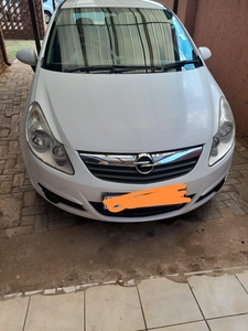 Opel Corsa 2010 model in immaculate condition for sale, it is white in colour.