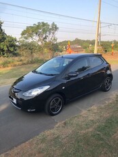 Mazda2 automatic 1 3 engine 2009 used with a leather seat the car is 100% very lit on petrol aircon.