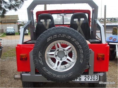 Red Jeep with Ford V6 Motor