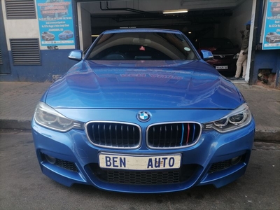 2014 BMW 320i, Blue with 93000km available now!