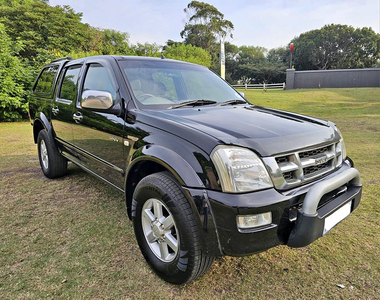 Black Beauty Isuzu KB300 T D L X Double Cab With Canopy And Mag Wheels.