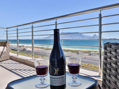 Upmarket Two Bedroom Bloubergstrand Beachfront Haven with Table Mountain Views