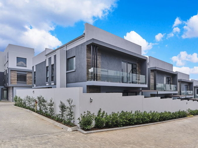 Exquisite 4-Bedroom Residence with Modern Elegance and Luxury Features