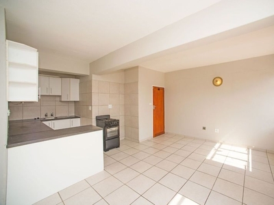 Well-maintained sun filled 2 bedroom lock up and go unit in heart of Impala Park.