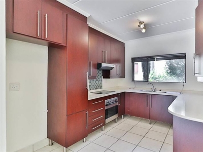Secure first floor townhouse offers 2 bedrooms with built-in cupboards