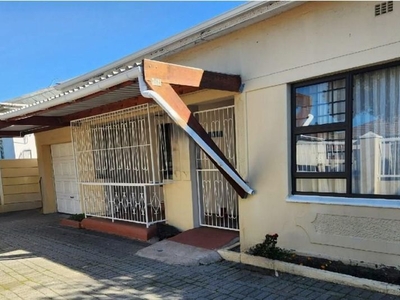 Property Description: Charming 3-Bedroom Home with Income-Generating Flat