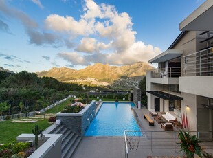 A Modern, Sophisticated, fully furnished Villa in a fine suburb in Hout Bay with Mountain and Sea Views!