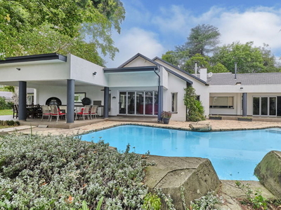 Stunning 5-Bedroom Home with 2 Cottages in Riverclub, Bryanston - A Rare Gem!