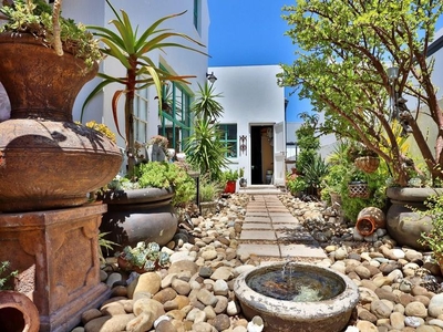 Enchanting haven where a beautiful home embraces a lovely garden