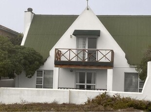 Stunning Beach House: Ideal Investment Opportunity or Perfect for a Young-at-Heart Retiree Couple