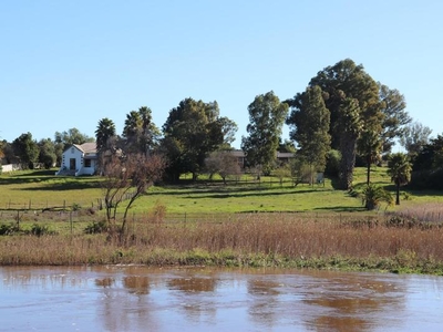 Immaculately presented riverfront smallholding