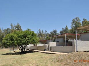 Investment Property with Potential in Zwartkops - 9 Ha with 6 rented cottages