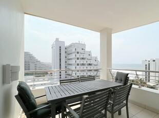 Experience the ultimate beachfront lifestyle in this stunning apartment