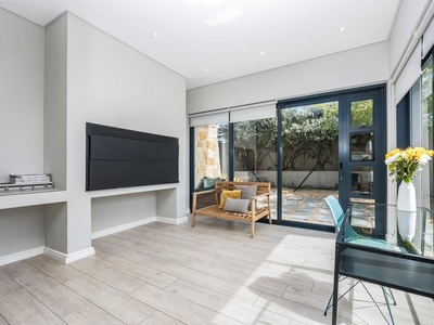 Immaculate North facing, chic and modern single level release in The Village!
