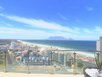 BEACHFRONT PENTHOUSE with NORTH and SOUTH facing BALCONIES (RARE)