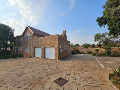 Well looked after, first floor, 2-bedroom townhouse with garage.