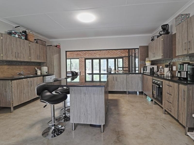 Cosy face brick home situated in a beautiful setting with indigenous bush for sale in Marloth Park