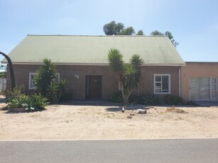 Lovely family home with potential for sale in Stompneusbay, St Helena Bay